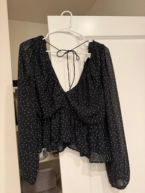 H&M Black Blouse with White Polka Dots and Ruffle Hem